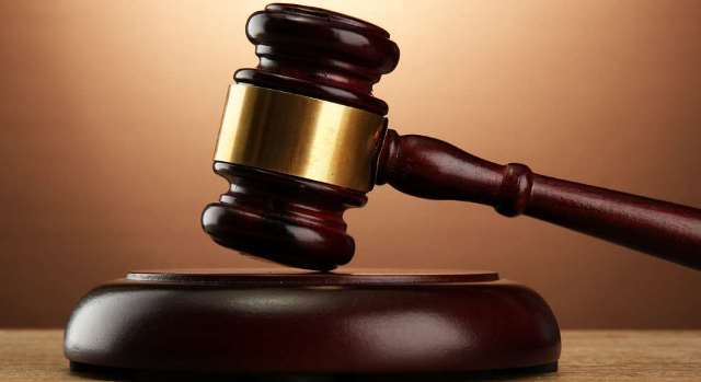 Court remands man, 35, charged with stealing a bag