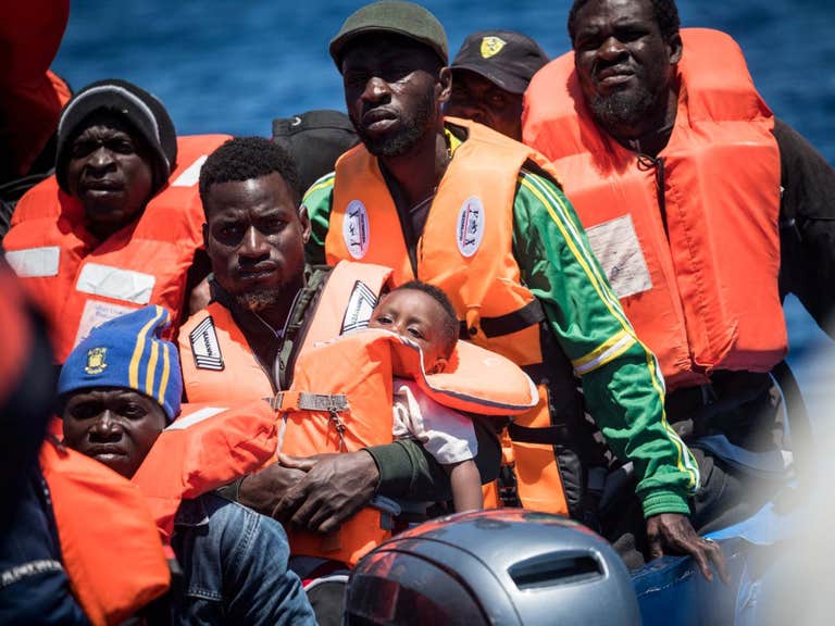 Italy passes law to fine people who rescue refugees at sea